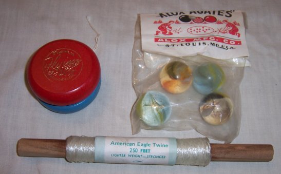 Alox kite string, agate marbles, and "yo-yo"